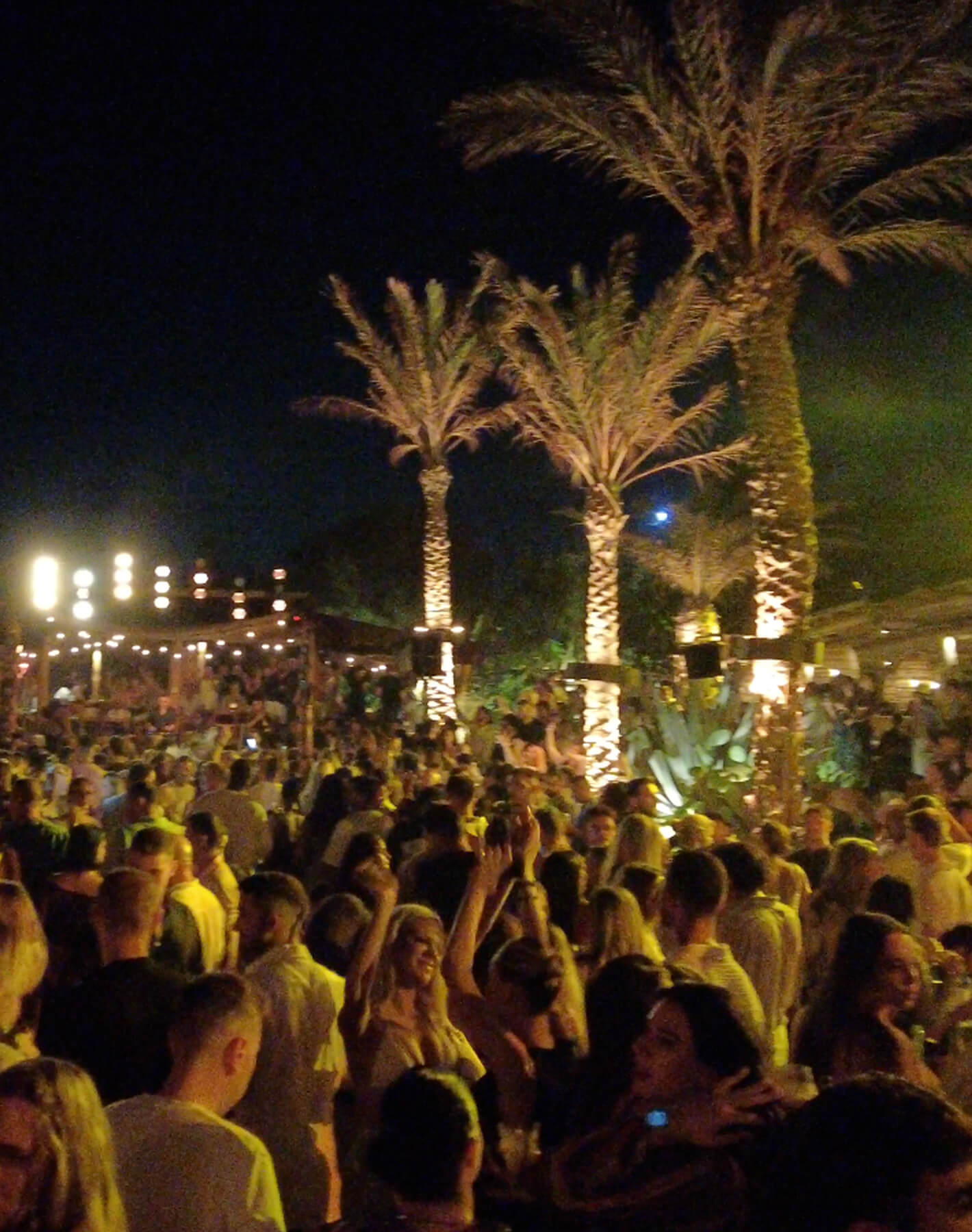 Mykonos nights come alive at the bustling club. Dancing, drinks, laughter, and endless enjoyment under the stars.